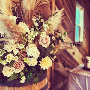 Close up of artificial wedding arrangement rental at wedding venue in Hickory, NC.