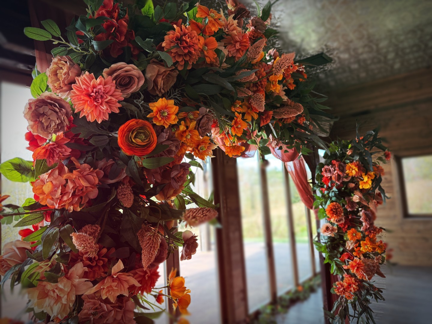 ID-Arbor-3 Intense Devotion wedding floral set with vibrant orange and red flowers