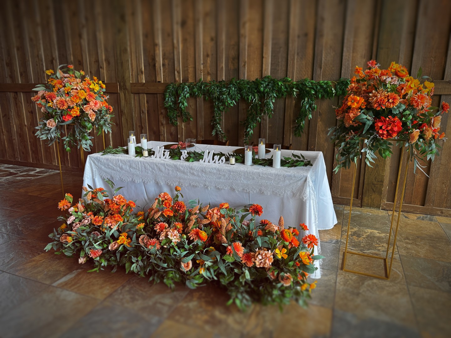 Bold wedding arbor with lush florals from Intense Devotion rental set