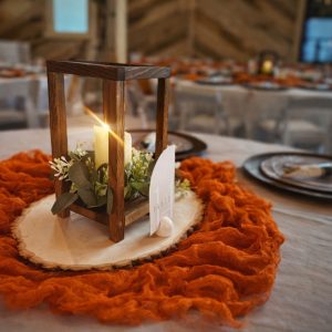 Rental woodsy centerpiece for reception decor and floral in Charlotte, NC.